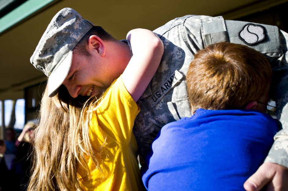 Soldier surprises his kids at school while on leave for the holidays