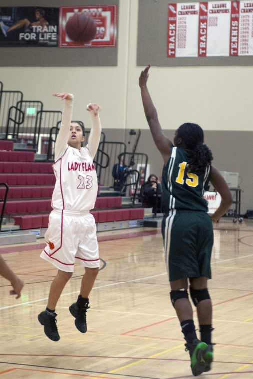 Girls basketball: Flames let large lead slip away, remain winless in league play 