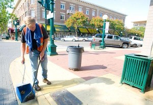 United Cerebral Palsy workers will continue cleaning up School Street. 