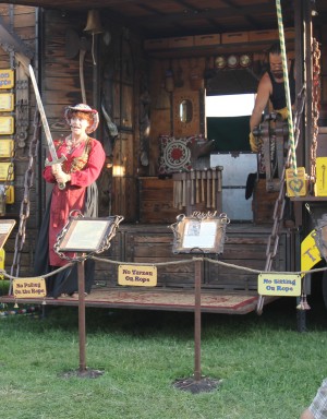 Happy gypsies visit Lodi Grape Festival; one a blacksmith, one a storyteller