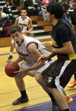 Boys basketball: Tigers use big third quarter to roll past Delta Kings 