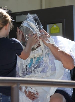 Woodbridge Elementary School principal John Kirilov takes pie to the face for fundraiser