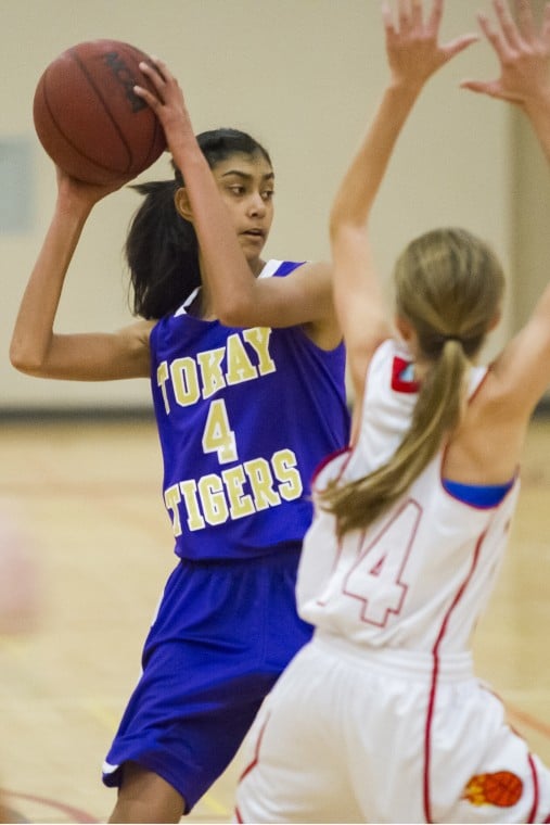 Girls basketball: Flames hold off Tigers’ late charge in thrilling finish 