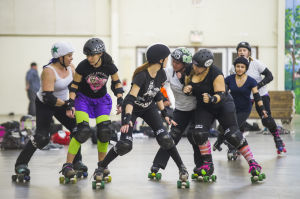 Reporter Skates After Her Derby Girl Dreams : Members of the Port City Roller Girls roller derby team scrimmage during practice at the San Joaquin County Fairgrounds at the San Joaquin County Fairgrounds on Thursday, Feb. 7, 2013.
 - Photo by Dan Evans/News-Sentinel