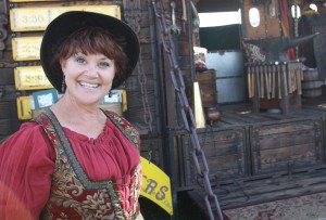 Happy gypsies visit Lodi Grape Festival; one a blacksmith, one a storyteller