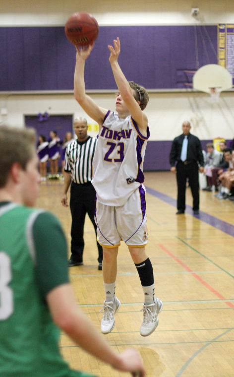 Boys basketball: Tigers hang tough for a half, but Rams pull away