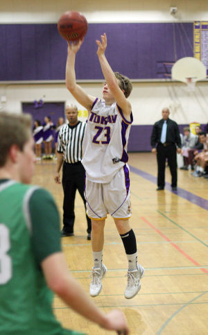 Boys basketball: Tigers hang tough for a half, but Rams pull away