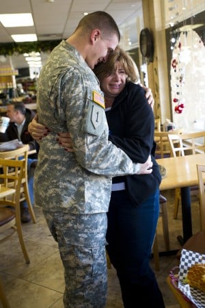 Tears flow as soldier, mom reunite