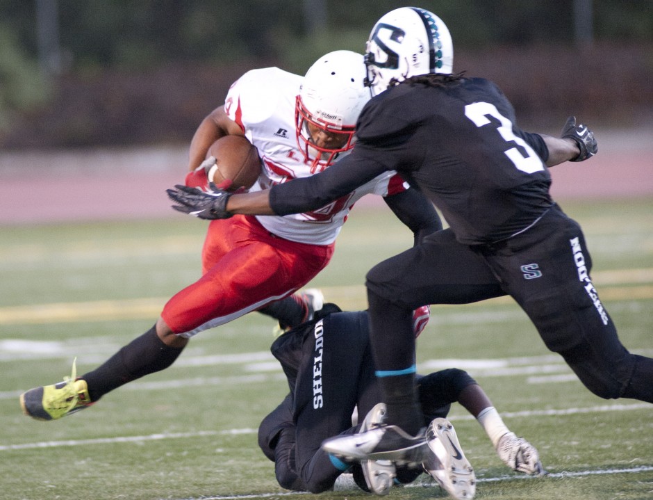 Flames fade late, fall to Huskies in opener