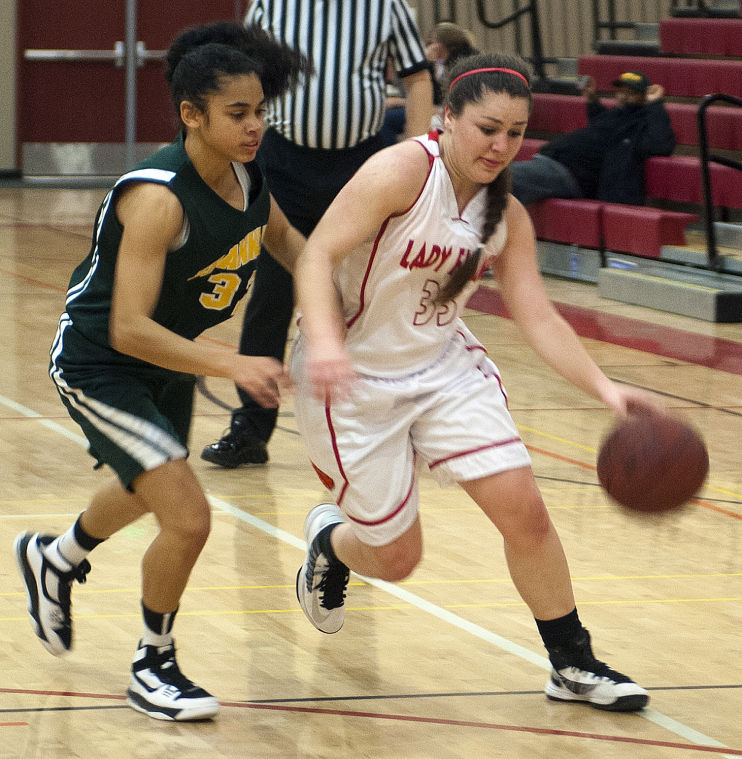Girls basketball: Flames let large lead slip away, remain winless in league play 