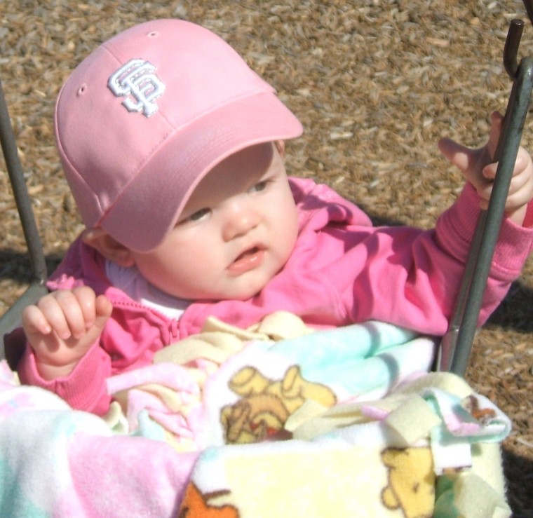 Enjoying the swings at Henry Glaves Park