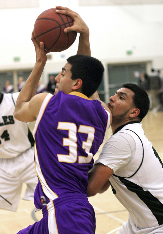 Boys basketball: Tigers prove tough in crucial moments 