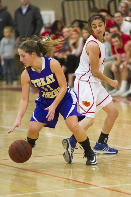 Girls basketball: Flames hold off Tigers’ late charge in thrilling finish 