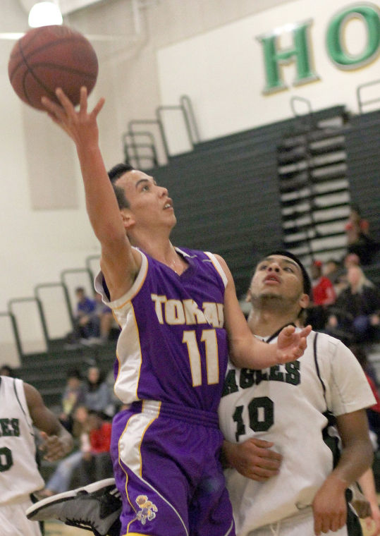 Boys basketball: Tigers prove tough in crucial moments 