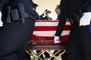 Fallen Galt Police Officer Kevin Tonn Laid To Rest : Galt Police Officer Kevin Tonn’s casket is escorted into the service as officers salute at Adventure Community Church in Roseville on Monday, Jan. 21, 2013.
 - Photo by Dan Evans/News-Sentinel