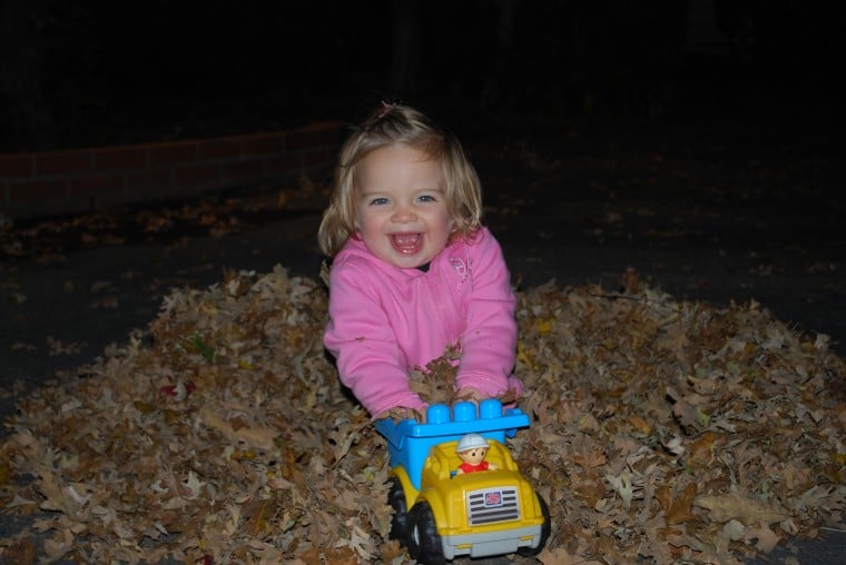 Playing with the fall leaves