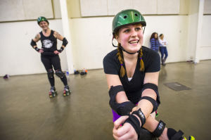Reporter Skates After Her Derby Girl Dreams : News-Sentinel reporter Sara Jane Pohlman takes a knee, giving up the roller derby challenge after an hour of drills and falling at the San Joaquin County Fairgrounds on Thursday, Feb. 7, 2013.
 - Photo by Dan Evans/News-Sentinel