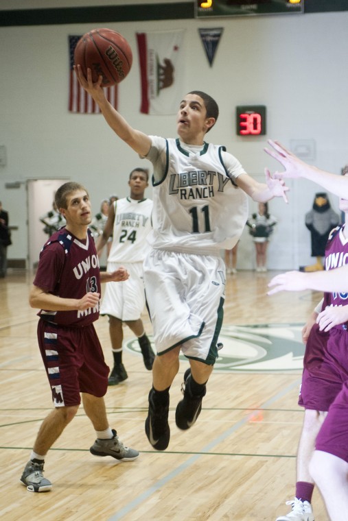 Boys basketball: Hawks soar in second half