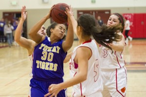 Girls basketball: Flames hold off Tigers’ late charge in thrilling finish 