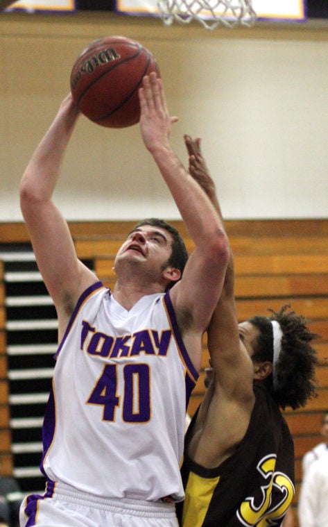 Boys basketball: Tigers use big third quarter to roll past Delta Kings 