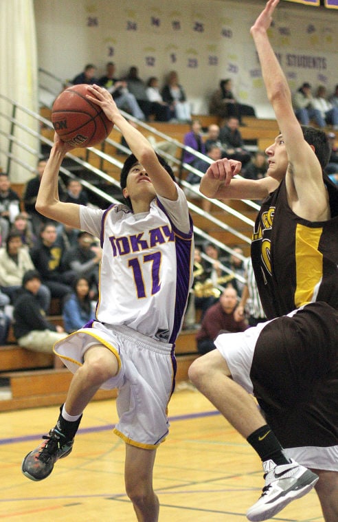 Boys basketball: Tigers use big third quarter to roll past Delta Kings 