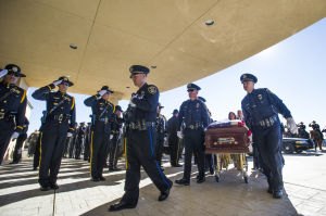 Fallen Galt Police Officer Kevin Tonn Laid To Rest : Officers stand at full attention as Galt Police Officer Kevin Tonn’s casket is escorted into the service at Adventure Community Church in Roseville on Monday, Jan. 21, 2013.
 - Photo by Dan Evans/News-Sentinel