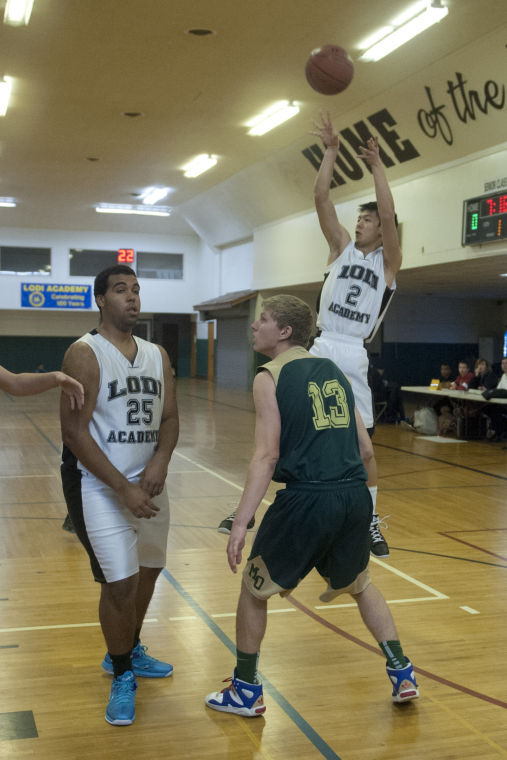 Boys basketball: Titans rout Eagles 