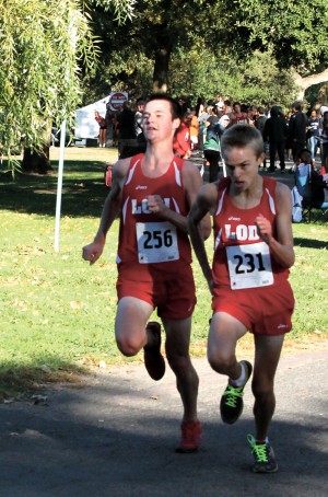 Tough road leads to title for Flames girls cross country team