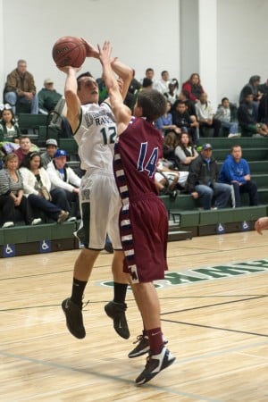 Boys basketball: Hawks soar in second half