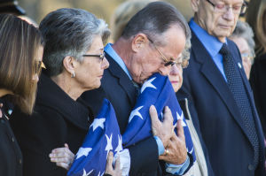 Fallen Galt Police Officer Kevin Tonn Laid To Rest : Will Tonn, Officer Kevin Tonn’s father, embraces a folded flag during his son’s graveside service on Monday, Jan. 21, 2013. Kevin Tonn was killed on Jan. 15, 2013, while on duty in Galt.
 - Photo by Dan Evans/News-Sentinel