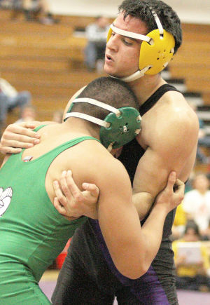 Wrestling: Tigers take down Rams in a rout 
