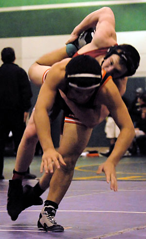 Wrestling: Julian Villanueva among three Flames Masters bound; Tigers have six qualifiers