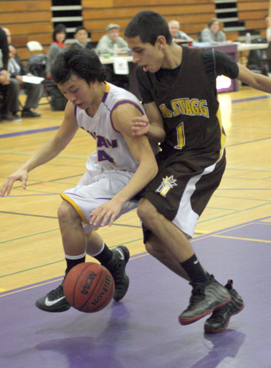 Boys basketball: Tigers use big third quarter to roll past Delta Kings 