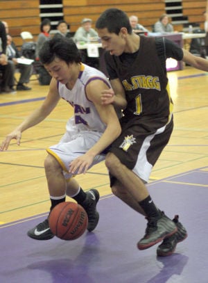 Boys basketball: Tigers use big third quarter to roll past Delta Kings 