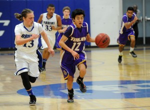 Tigers bounce Bruins in wire-to-wire boys basketball win