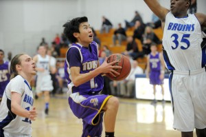 Tigers bounce Bruins in wire-to-wire boys basketball win