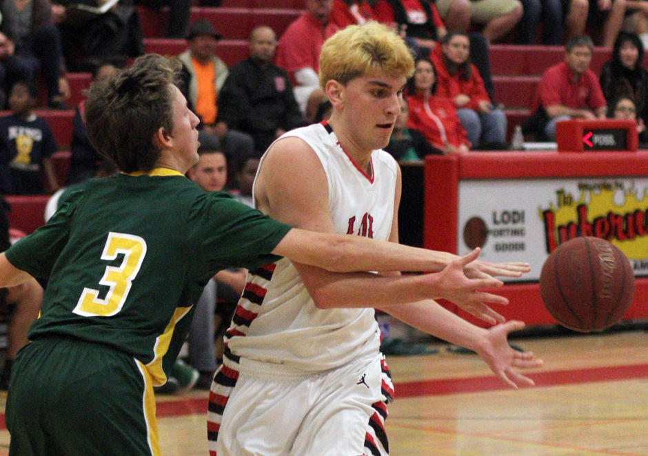 Boys basketball: Benjamin Simi, Flames dominate Yellowjackets 