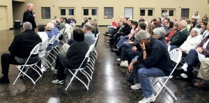 Father Michael Kelly speaks to supporters in Lockeford