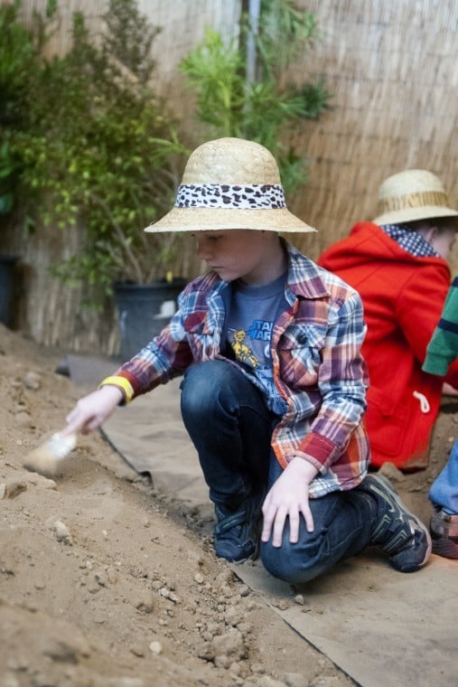Kids get their hands dirty learning about fossils at World of Wonders