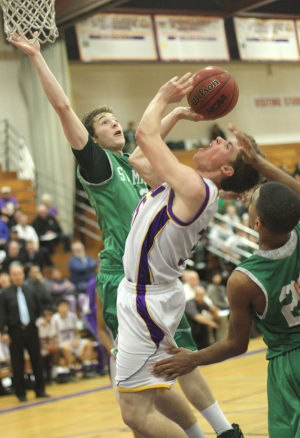 Boys basketball: Tigers hang tough for a half, but Rams pull away 
