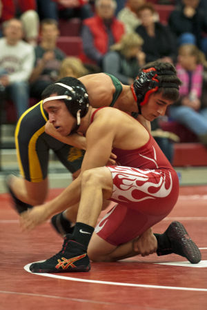 Wrestling: Flames rumble past Bulldogs 