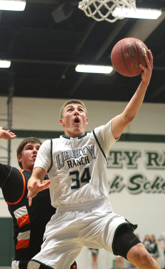 Boys basketball: Hawks hold off Cougars and make history