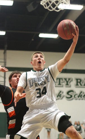 Boys basketball: Hawks hold off Cougars and make history