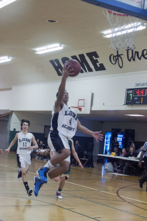 Boys basketball: Titans rout Eagles 