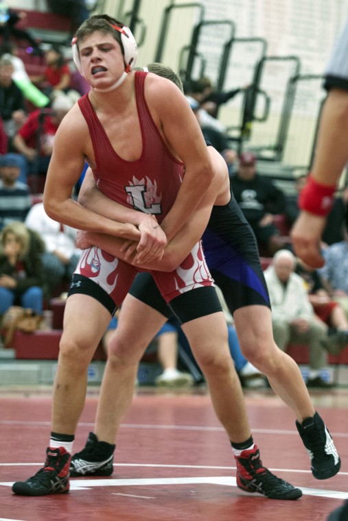 Tigers back on top, end two-year losing skid against Flames in wrestling