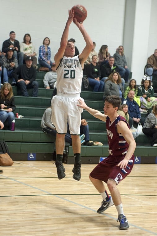 Boys basketball: Hawks soar in second half