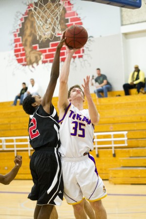 Boys basketball: Another tough loss as Tigers fall in overtime 