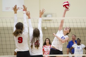 Big runs ignite the Flames over Tigers in varsity volleyball 