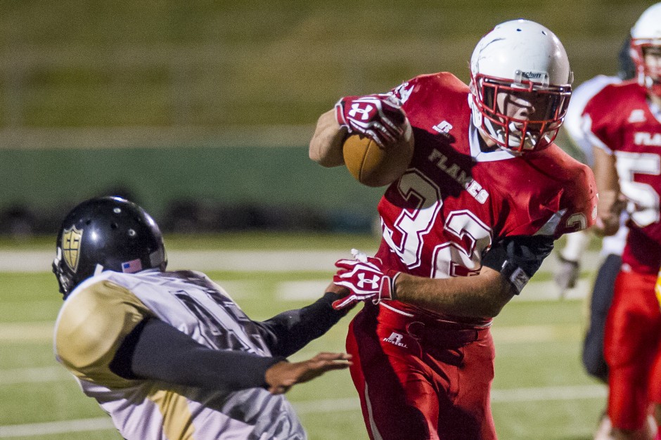 Flames erase 19-point deficit, rolls past Titans for first win 
