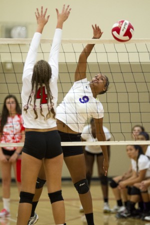 Big runs ignite the Flames over Tigers in varsity volleyball 